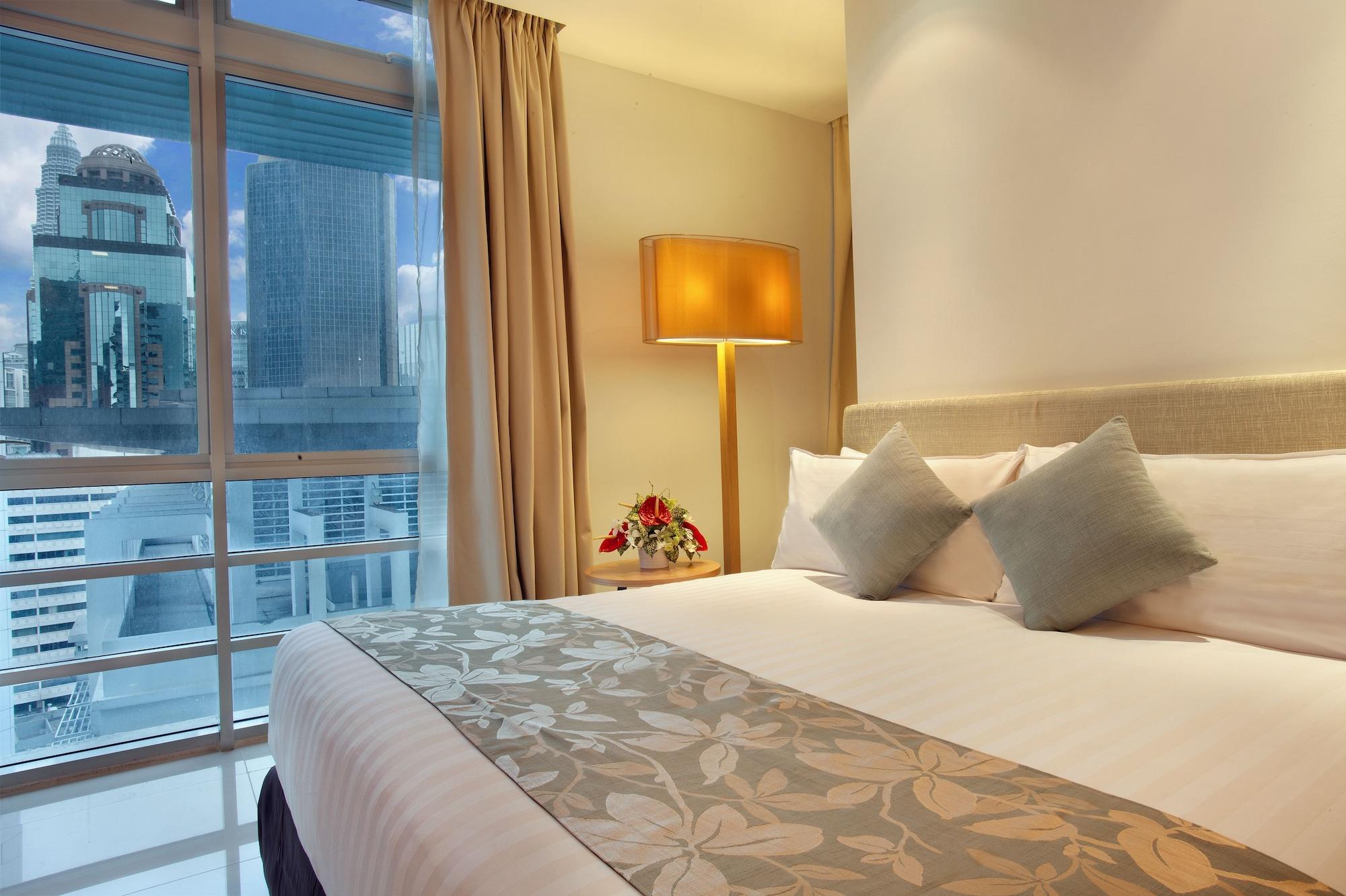 Parkroyal Serviced Suites Куала-Лумпур Номер фото A bedroom at the hotel