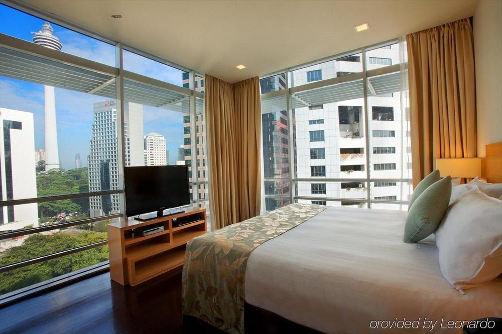 Parkroyal Serviced Suites Куала-Лумпур Номер фото A bedroom at the hotel